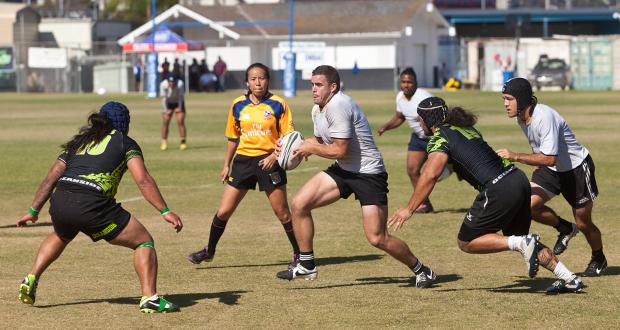 #10 of oside Chiefs Sal Ah San accompany by Casey Mauluulu #19.