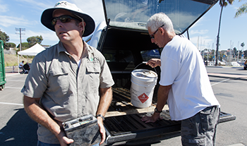 Scott Storms, owner of AQS Environmental helps