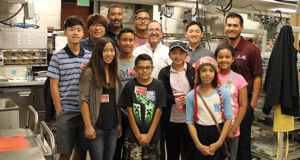 Pro Kids members and staff at their recent visit to Jack in the Box headquarters. Pictured (in center) Is Phillip Rudolph, Executive Vice President and Chief Legal Officer (courtesy photo)