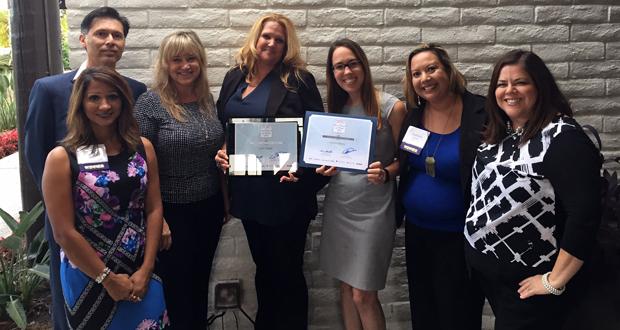 Employees at Pardee Homes San Diego display their “2016 Best Places to Work in San Diego” award and certificate. From left to right: Sonia Souza, Jimmy Ayala, Liz Belloso, Rhi Haymes, Tiffany Hynek, Stephanie Cooter and Liz Ramirez.
