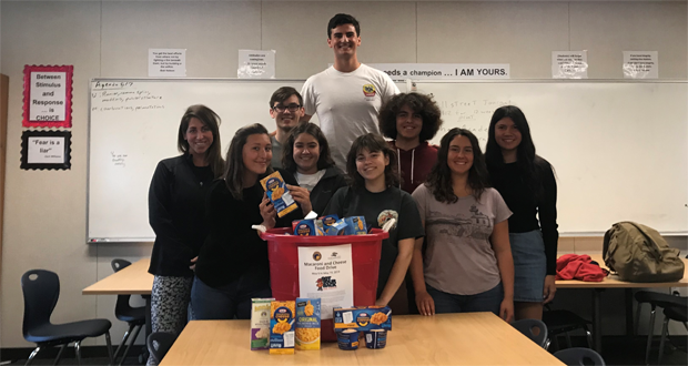 San Dieguito Academy Water Polo Club gathers around the macaroni and cheese donations for Got Your Back San Diego.
From left: San Dieguito Academy Teacher and Water Polo Club Supervisor Jaimee Duck with club members: Vice President Olivia Alcantar, Cooper Waite, Katie Eliceiri, Brandon Rudman, Eryn Broughton, President Dylan Herrera, and Malia Pandes.
(courtesy photo)