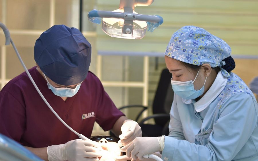 International dentists at work. (Photo by Hike Shaw, Unsplash)