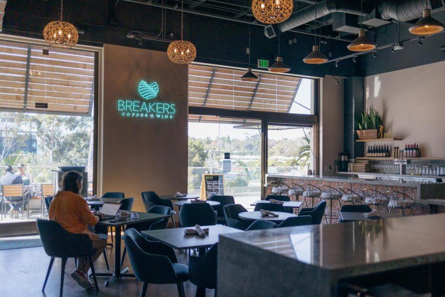 A Breakers Coffee + Wine customer works on their laptop Feb. 17 inside the coffee shop and wine bar, which opened last year in Carmel Valley, near Del Mar. (Photo by Jen Acosta)