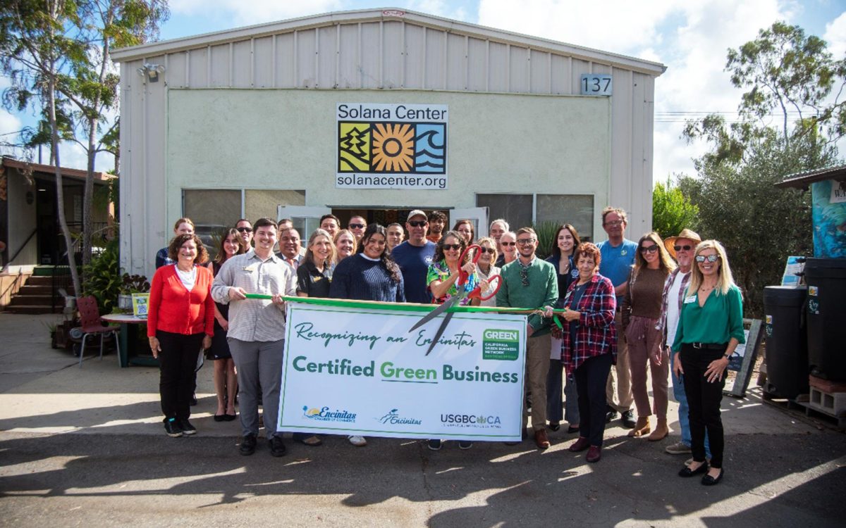 Representatives of the Solana Center for Environmental Innovation, Encinitas Chamber of Commerce and city of Encinitas celebrate a green ribbon cutting Oct. 29 for the center’s green business certification. (Courtesy photo)